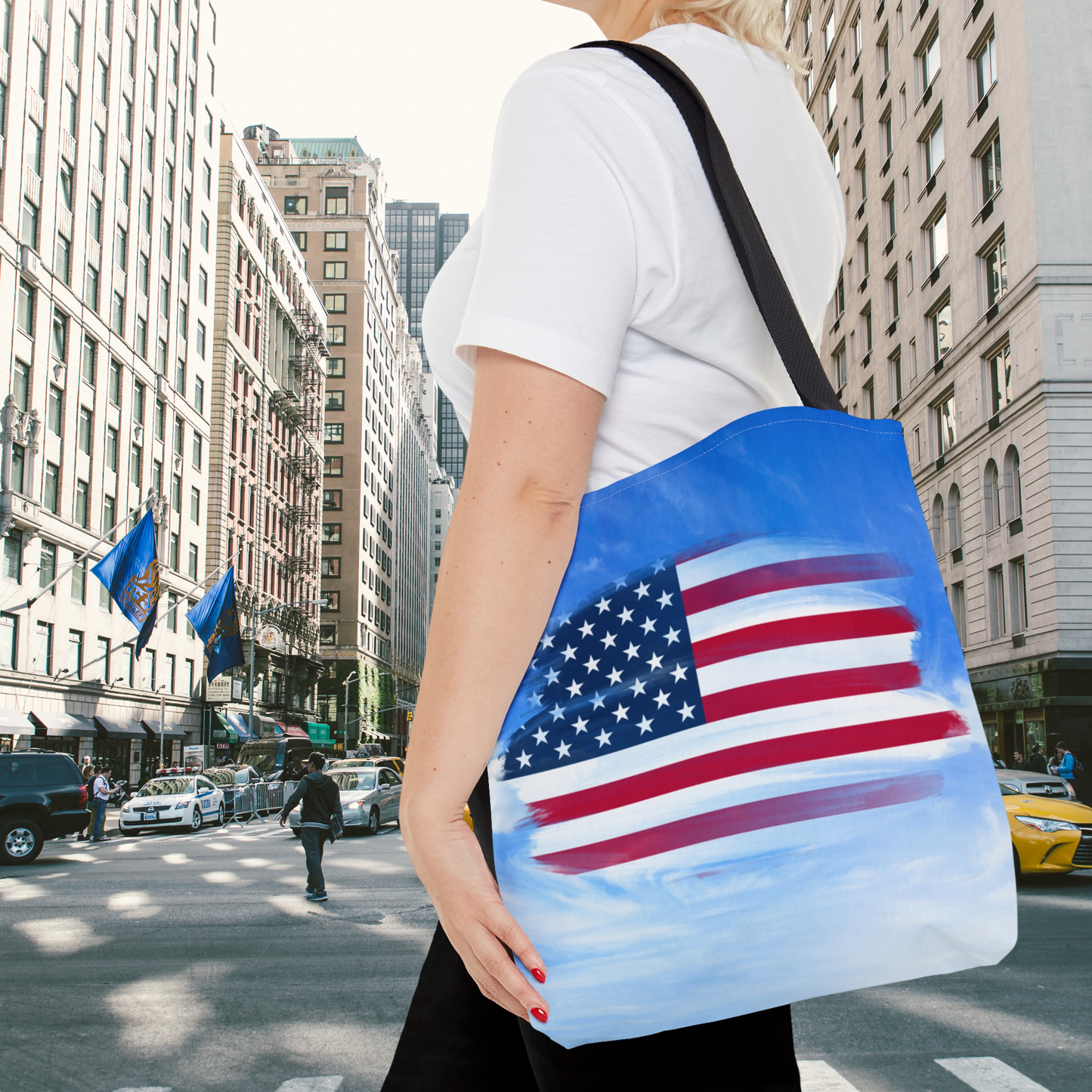 The sleek black cotton handles provide both comfort and style, allowing for effortless carrying.